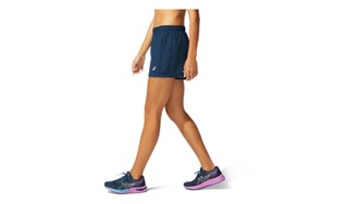 Short running  woman icon blue
